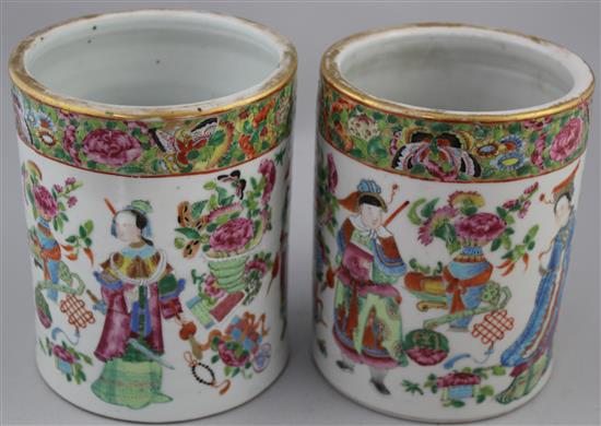 A pair of Chinese Canton-decorated famille rose brush pots, Daoguang period, 16cm, one cracked